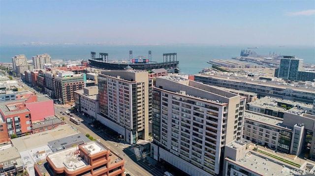 birds eye view of property with a water view