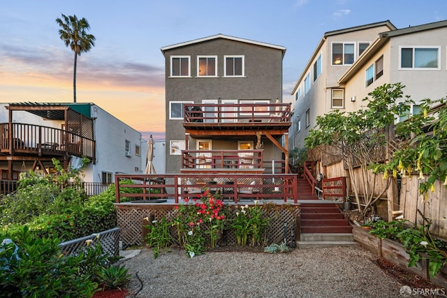 4551 Fairbairn Ave, Oakland, CA 94619 - back of house featuring a deck and stucco siding