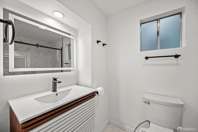 4551 Fairbairn Ave, Oakland, CA 94619 - bathroom featuring vanity, a marble finish shower, and marble finish flooring