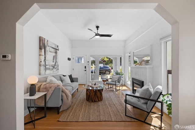 4551 Fairbairn Ave, Oakland, CA 94619 - living area featuring ceiling fan, wood finished floors, and a tile fireplace