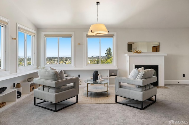 4551 Fairbairn Ave, Oakland, CA 94619 - living area featuring a fireplace with flush hearth, carpet, and vaulted ceiling