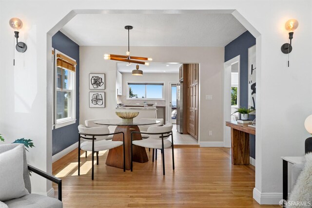 4551 Fairbairn Ave, Oakland, CA 94619 - dining room with light wood-style flooring and baseboards