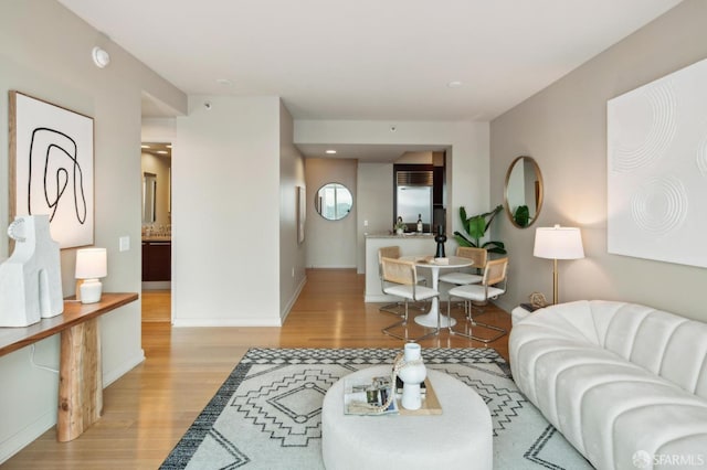 living room with light hardwood / wood-style floors