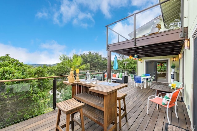 deck with outdoor dining space