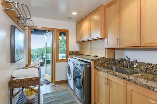 laundry room with visible vents, cabinet space, a sink, recessed lighting, and washer and dryer