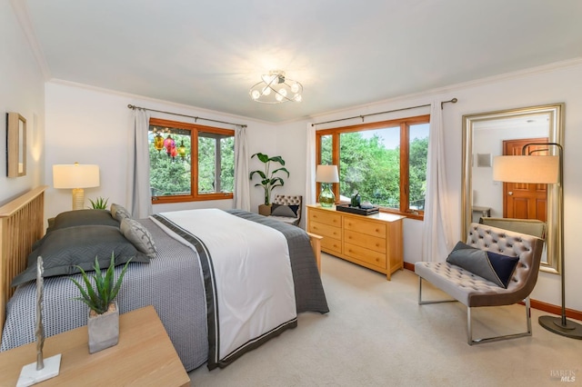 bedroom with crown molding and light carpet