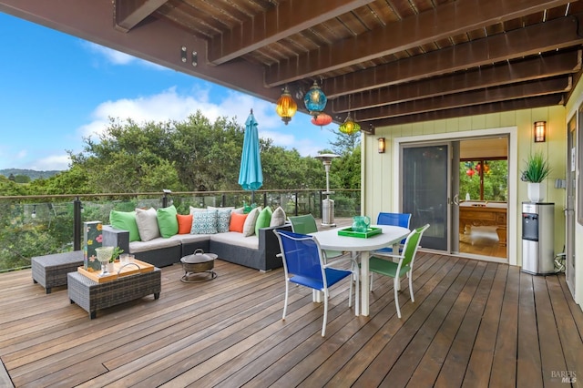 deck featuring outdoor lounge area and outdoor dining area