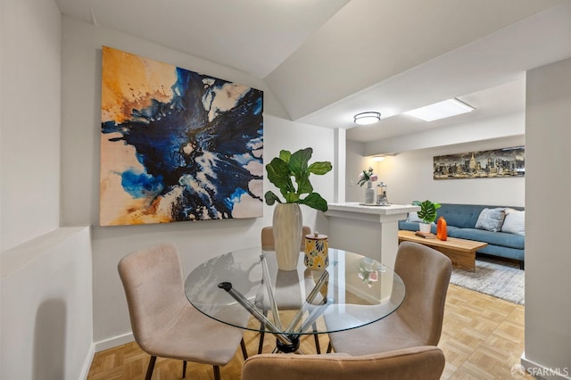 dining room featuring baseboards
