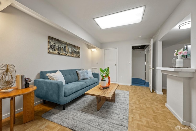 living room featuring baseboards
