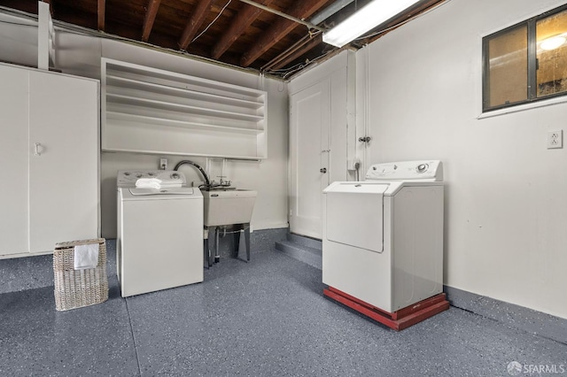 laundry room with independent washer and dryer and laundry area