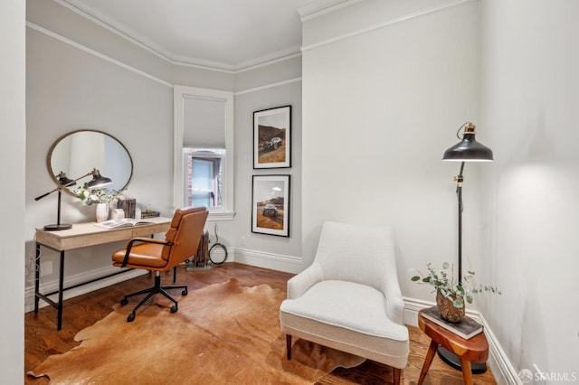 home office with crown molding, baseboards, and wood finished floors