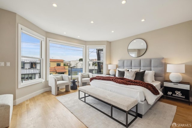 bedroom with light wood-type flooring