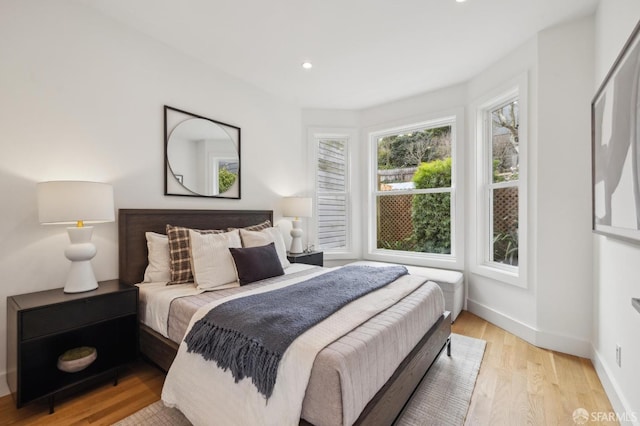 bedroom featuring light wood-type flooring