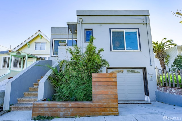 view of front of property with a garage