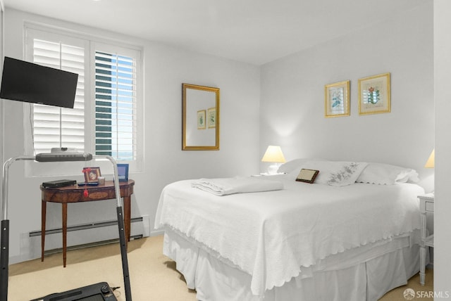 carpeted bedroom featuring a baseboard radiator