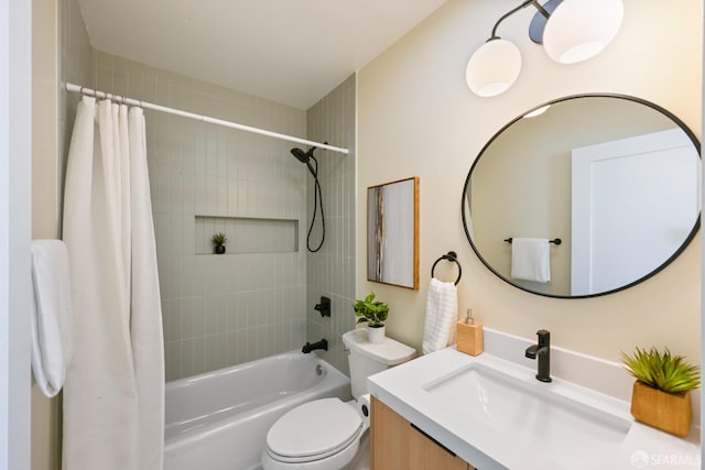 full bathroom featuring toilet, shower / bath combo with shower curtain, and vanity