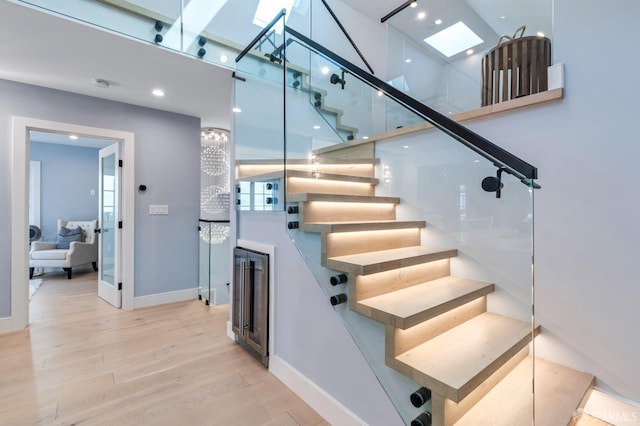 65 San Pablo Ave, San Francisco, CA 94127 - stairs with a skylight, wood finished floors, baseboards, and recessed lighting