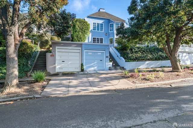 65 San Pablo Ave, San Francisco, CA 94127 - garage with concrete driveway