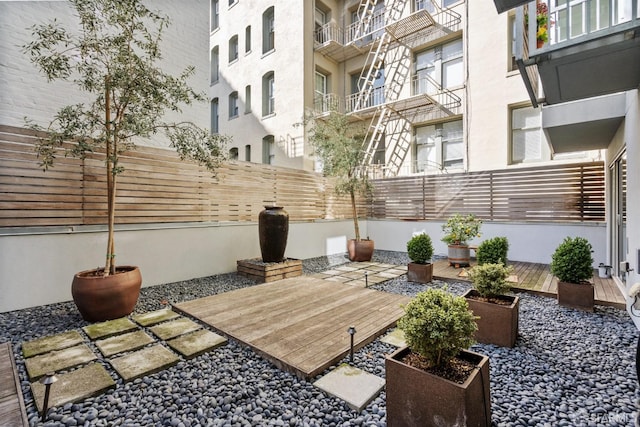 view of patio featuring fence