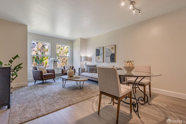 2225 23rd St Unit 318, San Francisco, CA 94107 - dining room featuring wood finished floors and baseboard heating