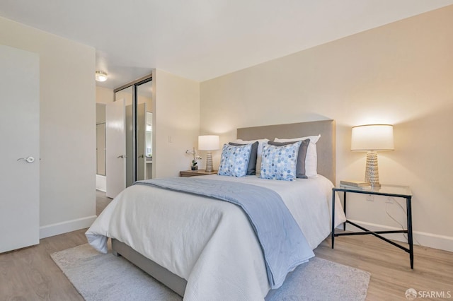 2225 23rd St Unit 318, San Francisco, CA 94107 - bedroom featuring wood finished floors and baseboards