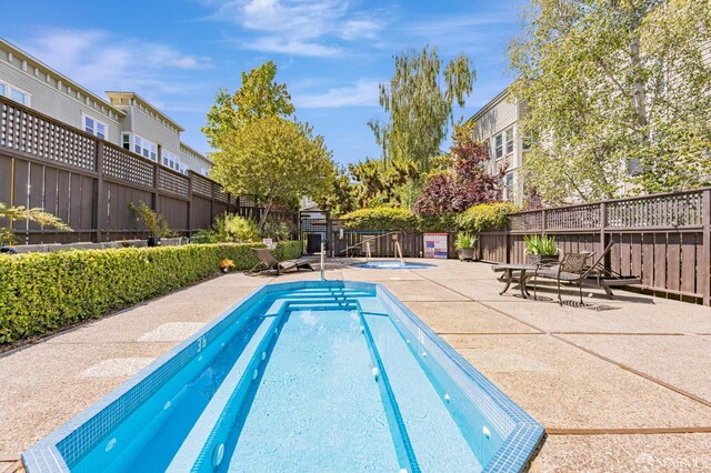 2225 23rd St Unit 318, San Francisco, CA 94107 - community pool featuring a hot tub and a patio area