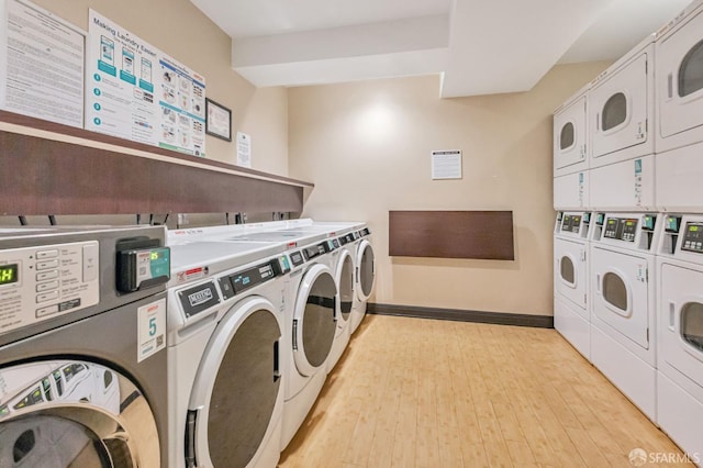 2225 23rd St Unit 318, San Francisco, CA 94107 - shared laundry room with washing machine and dryer, stacked washer / drying machine, and light wood-style floors