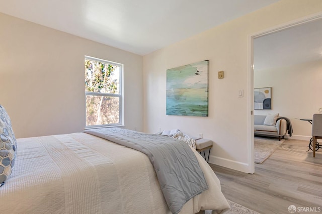 2225 23rd St Unit 318, San Francisco, CA 94107 - bedroom with wood finished floors and baseboards