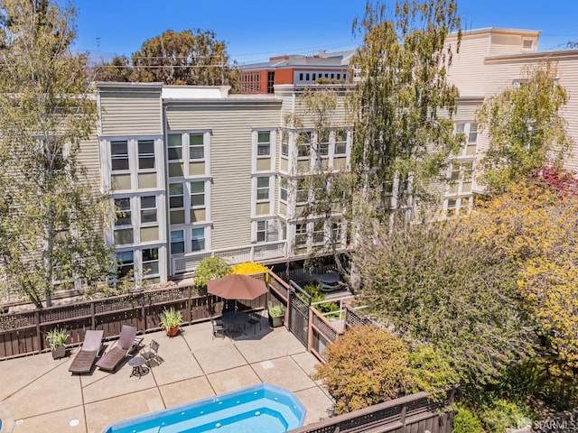 2225 23rd St Unit 318, San Francisco, CA 94107 - view of building exterior with a fenced backyard
