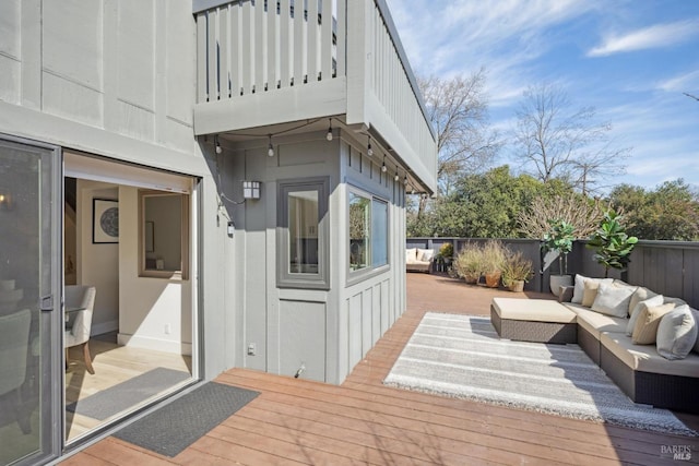 deck with fence and an outdoor hangout area