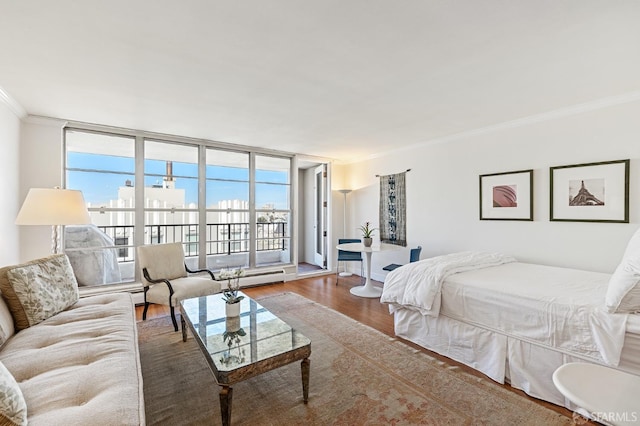 bedroom with expansive windows, ornamental molding, wood-type flooring, and access to exterior