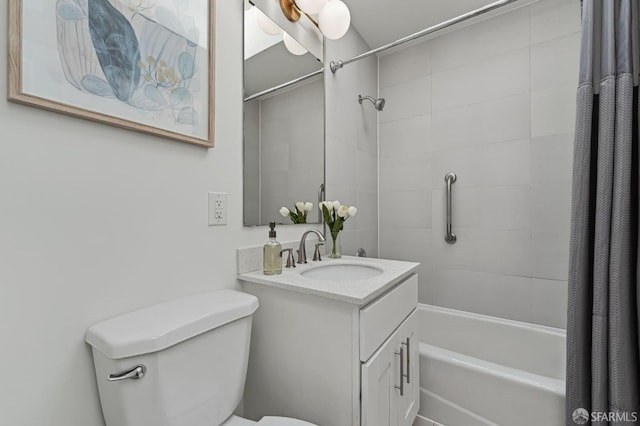 full bathroom featuring vanity, toilet, and shower / tub combo