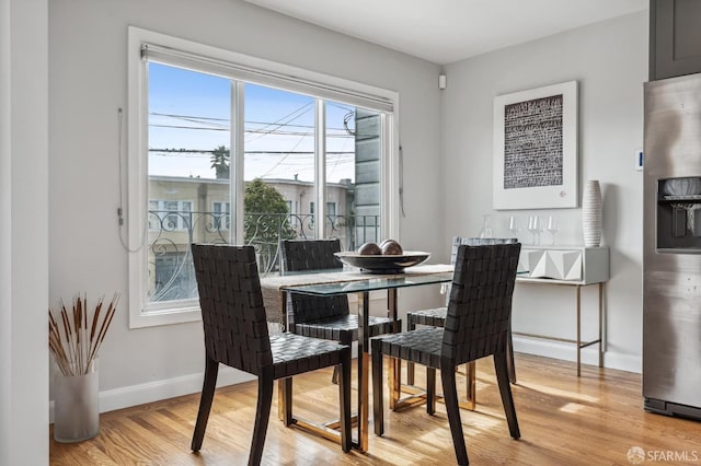 dining room featuring light hardwood / wood-style floors