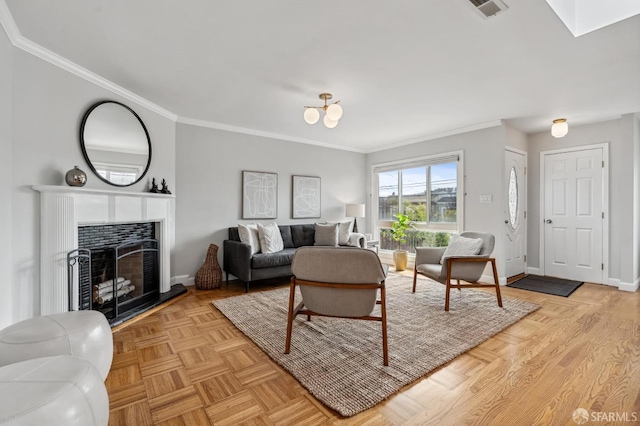 living room featuring ornamental molding and light parquet flooring