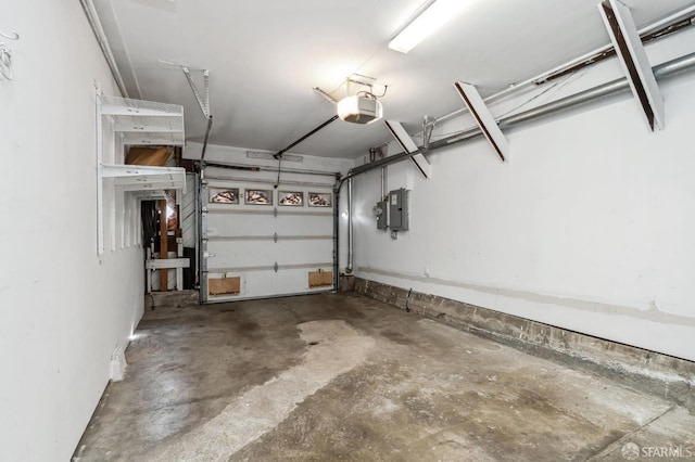 garage with electric panel and a garage door opener