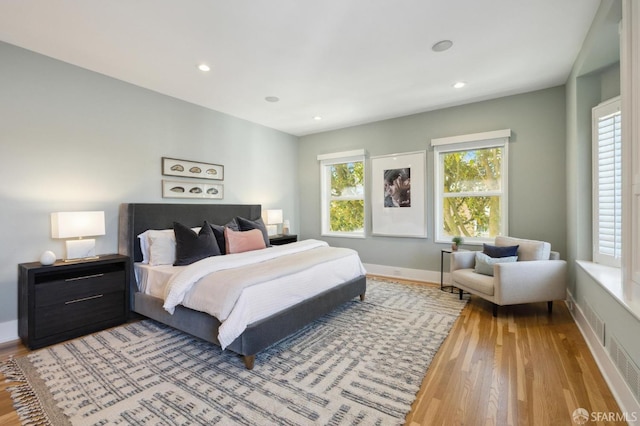 bedroom featuring hardwood / wood-style flooring