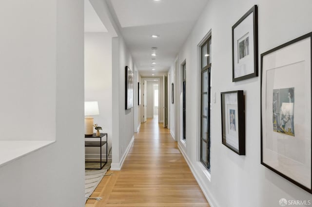 hallway featuring light hardwood / wood-style floors