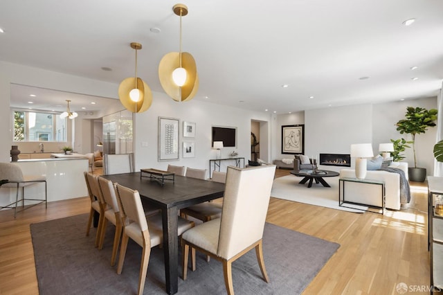 dining area with light wood-type flooring