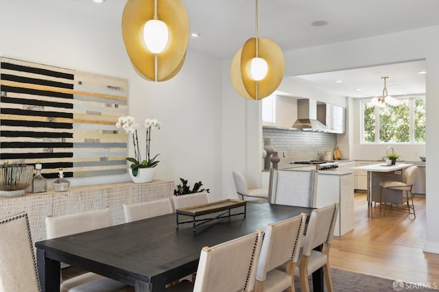 dining room with wood-type flooring