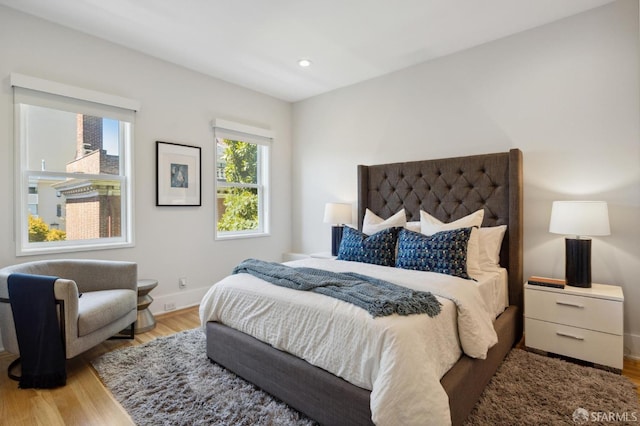 bedroom with wood-type flooring