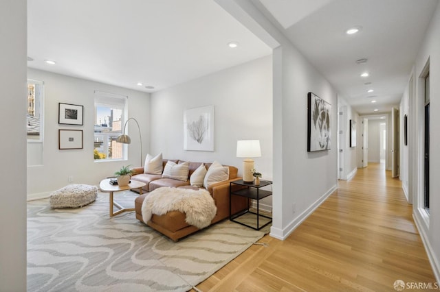 living room with light hardwood / wood-style flooring