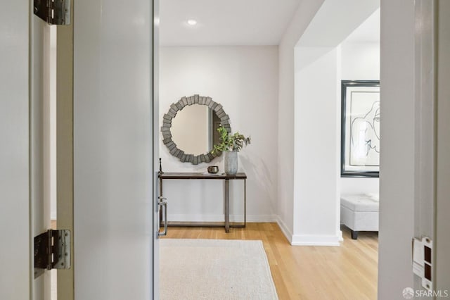 corridor featuring light hardwood / wood-style flooring