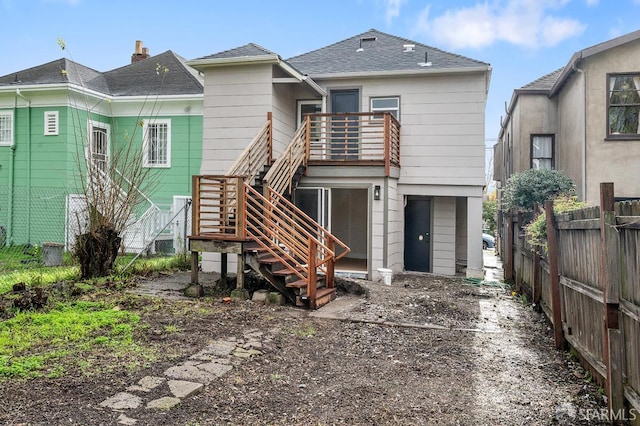 830 47th St, Emeryville, CA 94608 - back of property with stairs and roof with shingles