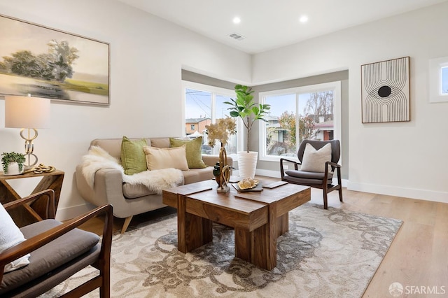 830 47th St, Emeryville, CA 94608 - living room featuring light wood-style floors, baseboards, and recessed lighting
