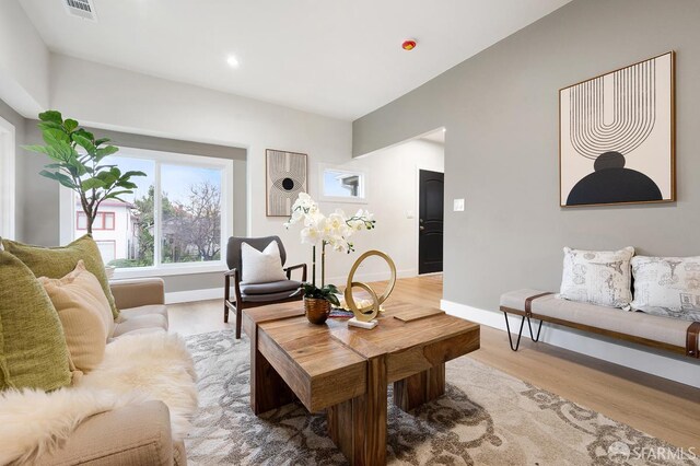 830 47th St, Emeryville, CA 94608 - living area with light wood finished floors, baseboards, and recessed lighting