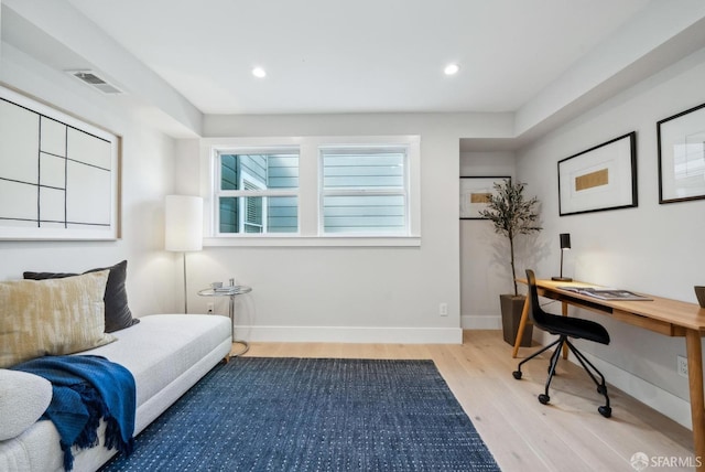 interior space featuring recessed lighting, visible vents, baseboards, and wood finished floors