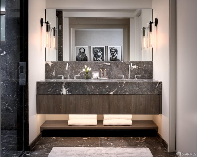 full bathroom featuring double vanity, decorative backsplash, and a sink