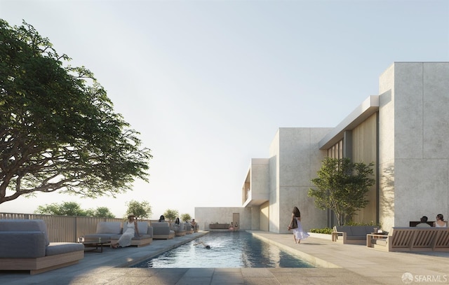 view of swimming pool with a patio area