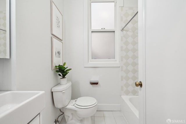 full bath featuring baseboards, a sink, toilet, and tile patterned floors