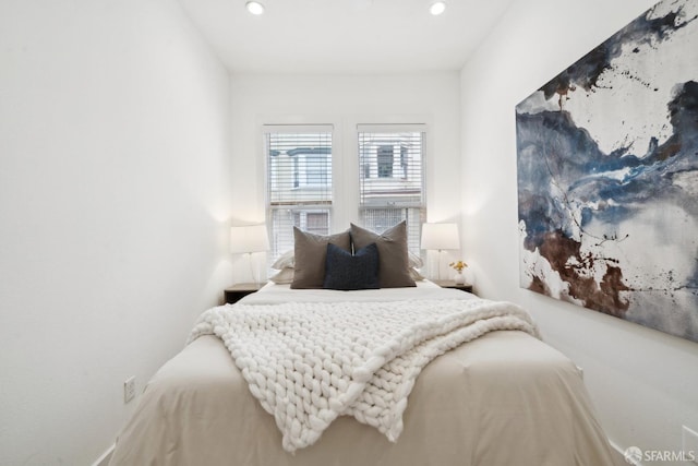 bedroom with recessed lighting